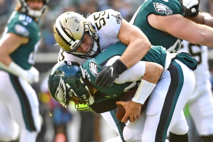Philadelphia Eagles quarterback Gardner Minshew (10) is sacked by New Orleans Saints linebacker Kaden Elliss (55). Mandatory Credit: Eric Hartline-USA TODAY